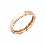 rose gold ring with a row of pave stones along the edge on white background