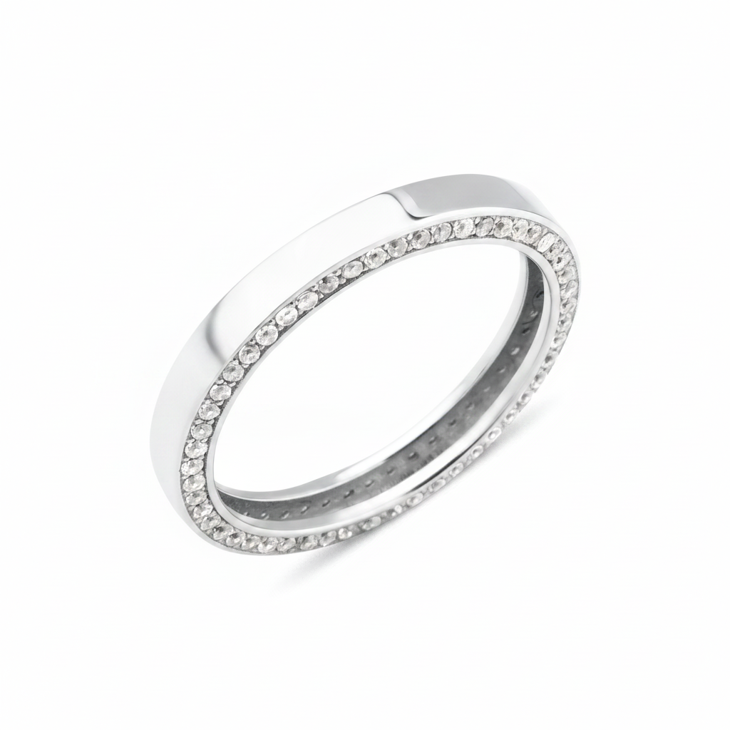white gold ring with a row of pave stones along the edge on white background