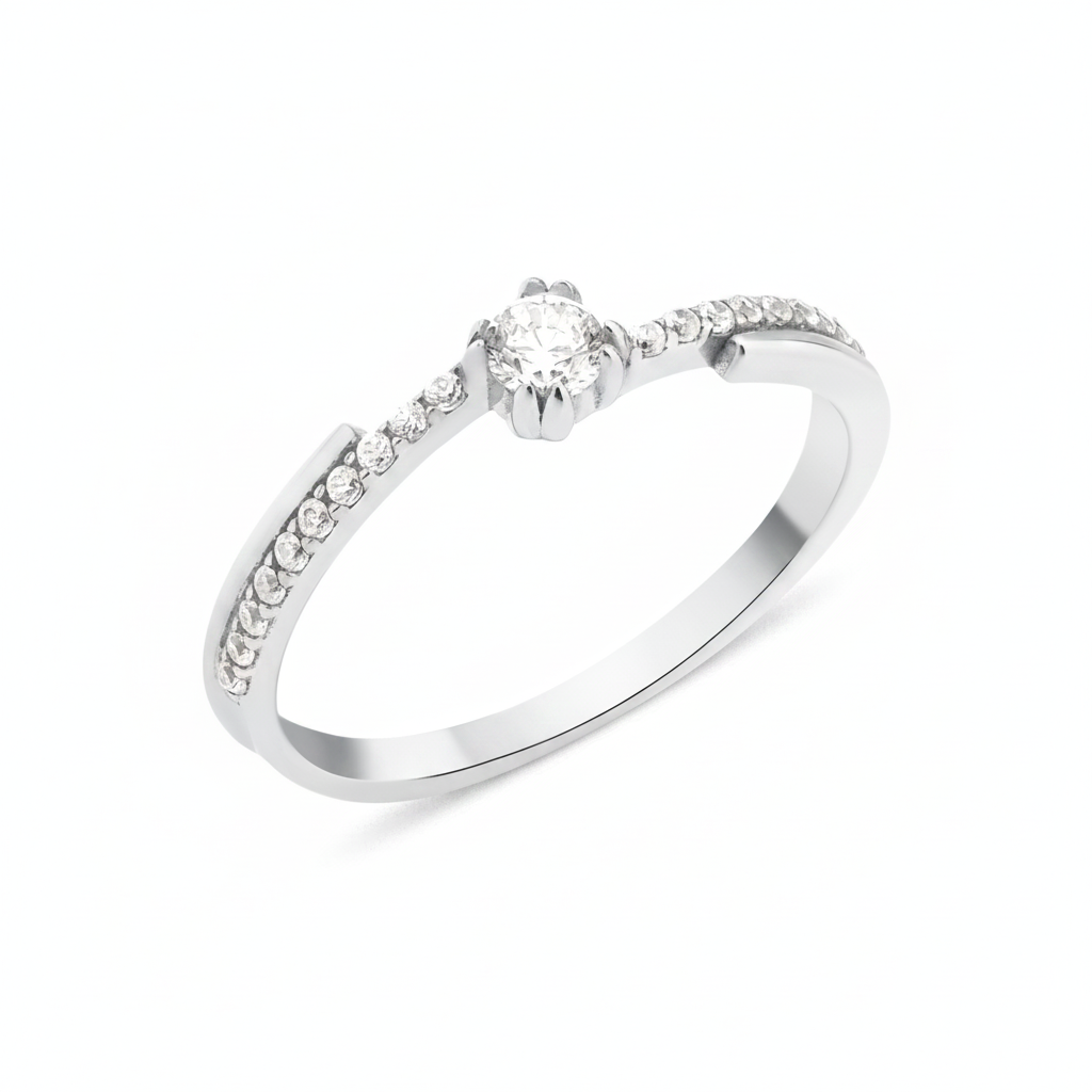 white gold ring with a channel of stones and a crowned center stone on white background