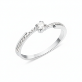 white gold ring with a channel of stones and a crowned center stone on white background