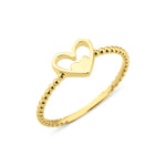 yellow gold ring with a nested heart motif on white background