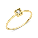 yellow gold ring with a stone set in a square frame on white background