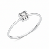 white gold ring with a stone set in a square frame on white background