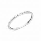 white gold ring with a braided texture on white background