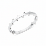 white gold ring with raised beaded texture on white background
