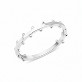 white gold ring with raised beaded texture on white background