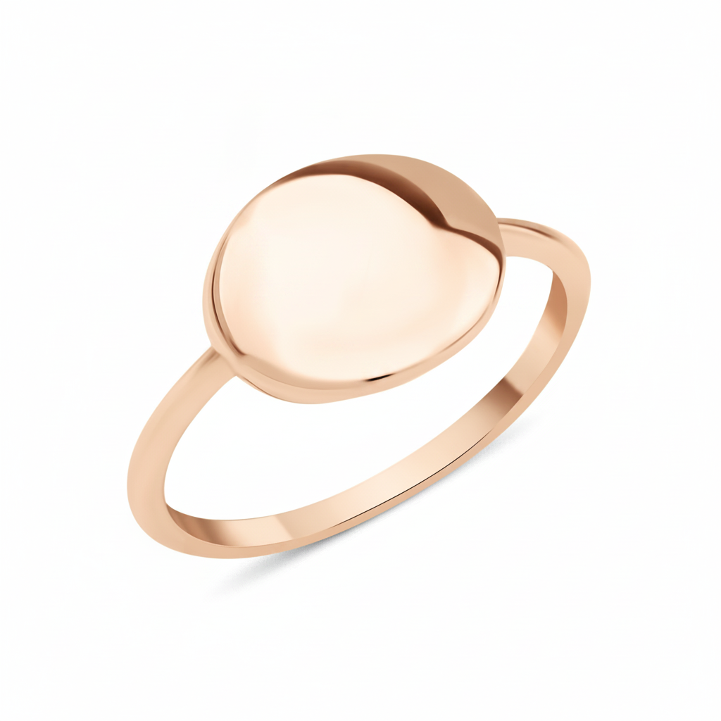 rose gold ring with a polished oval top on white background