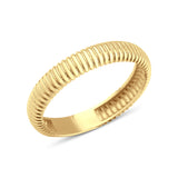 yellow gold ring with fine ribbed texture on white background