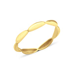 yellow gold ring with elongated pod links on white background