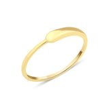 yellow gold ring with a smooth teardrop motif on white background