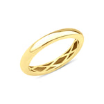 yellow gold band ring with a hidden lattice interior on white background