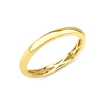 yellow gold band ring with a subtle carved interior on white background