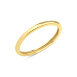 yellow gold Linea band ring on a white background