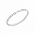 white gold etched Raya textured ring on a white background