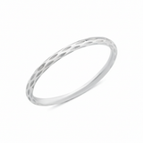 white gold etched Raya textured ring on a white background