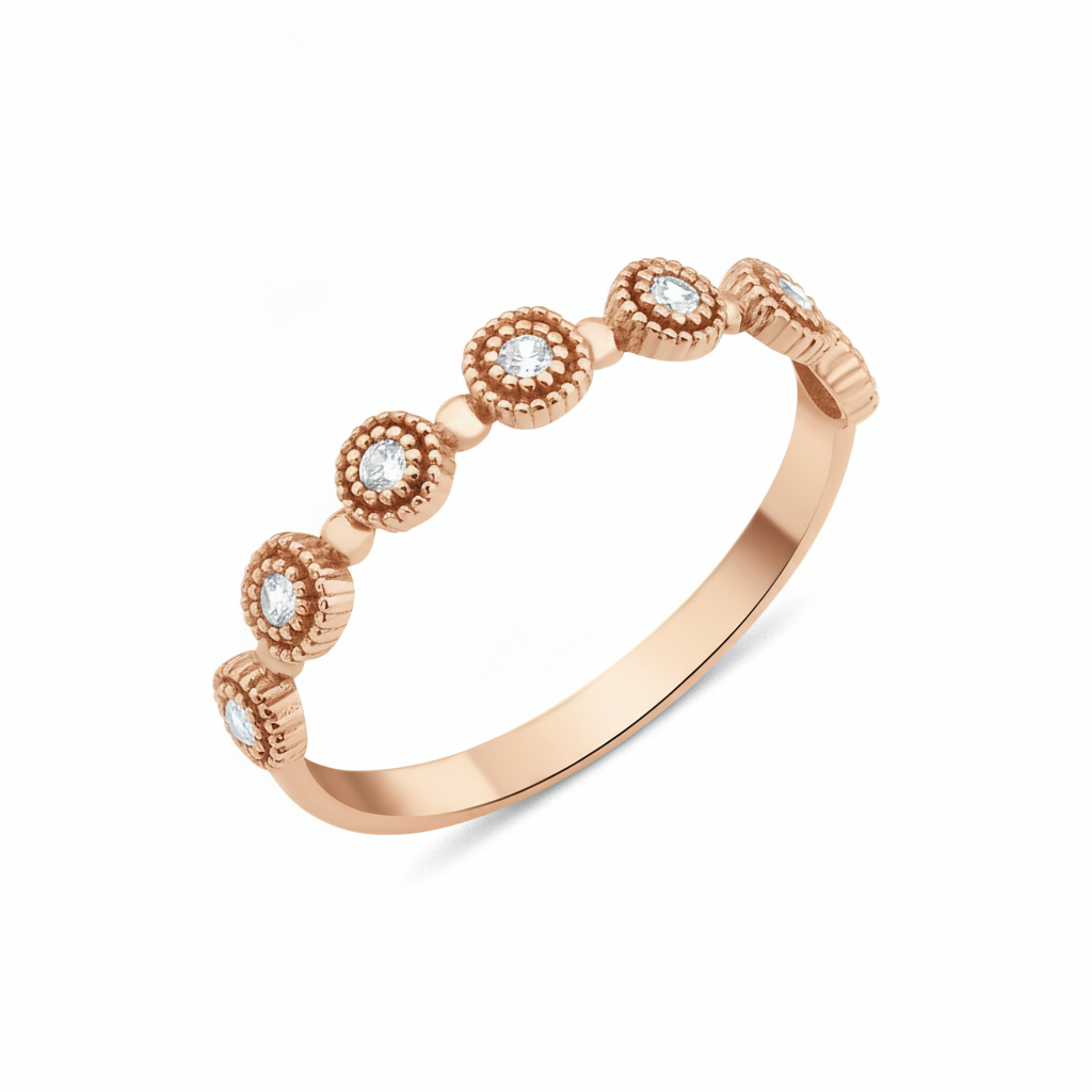 rose gold Aurelia station ring on a white background