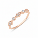 rose gold Solene station ring on a white background