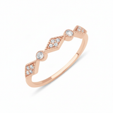 rose gold Solene station ring on a white background