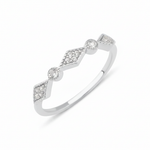 white gold Solene station ring on a white background