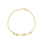 yellow gold double chain bracelet with square stone stations on white background
