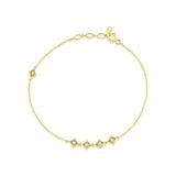 yellow gold Tessera station bracelet on a white background