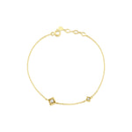 yellow gold Kadro bracelet on a white background