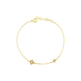 yellow gold Kadro bracelet on a white background
