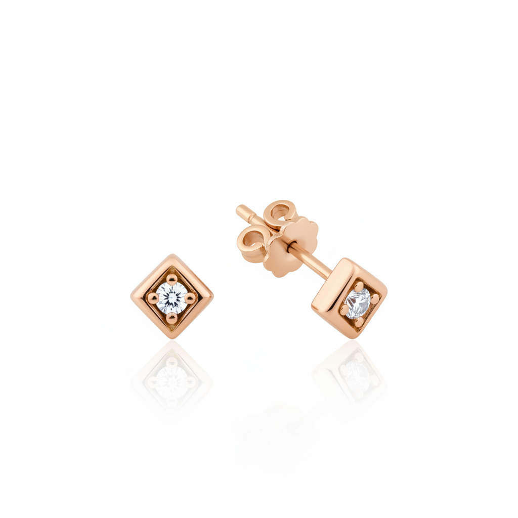rose gold Vera stud earrings on a white background