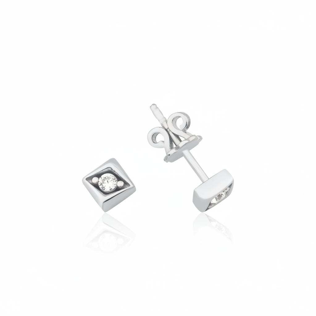 white gold Vera stud earrings on a white background