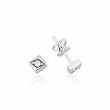 white gold Vera stud earrings on a white background