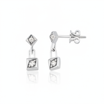 white gold Sora drop earrings on a white background