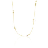 yellow gold Tessera station necklace on a white background