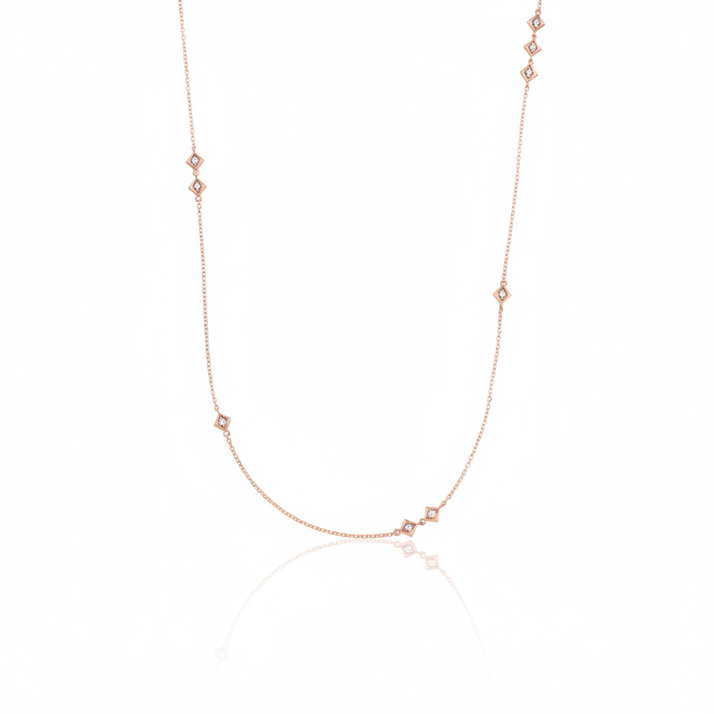 rose gold Tessera station necklace on a white background
