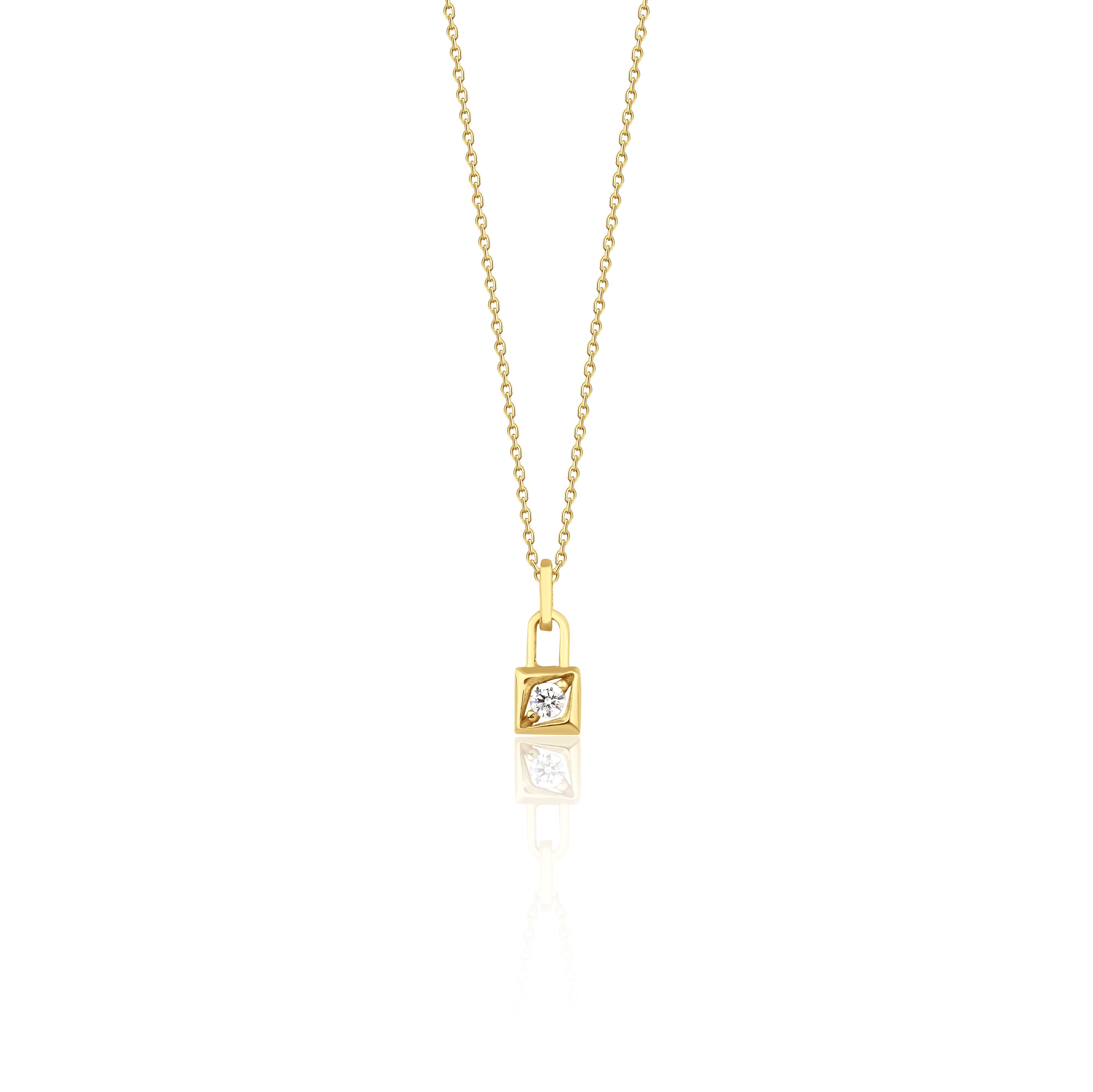 yellow gold padlock necklace on a white background