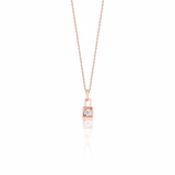 rose gold padlock necklace on a white background