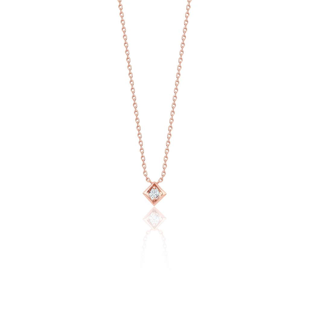 rose gold Quadra tilted pendant necklace on a white background