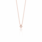 rose gold Quadra tilted pendant necklace on a white background
