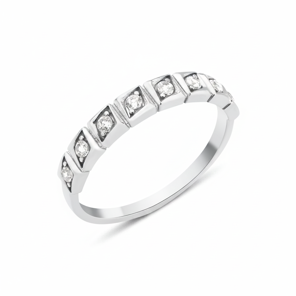 white gold Quadra row ring on a white background