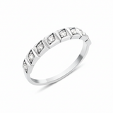 white gold Quadra row ring on a white background