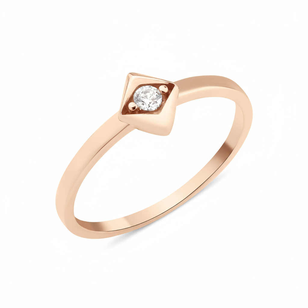 rose gold Quadra bezel ring on a white background