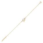 yellow gold Astra star charm bracelet on a white background