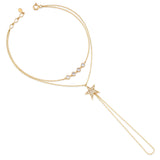 yellow gold Astra hand chain on a white background