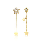 yellow gold Astra asymmetrical star drop earrings on a white background