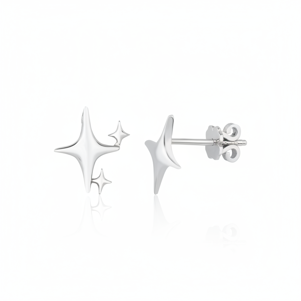 sculpted star cluster earrings in white gold on a white background