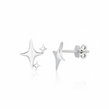 sculpted star cluster earrings in white gold on a white background