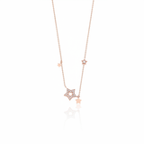 star station necklace in rose gold on a white background