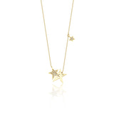 star cluster necklace in yellow gold on a white background