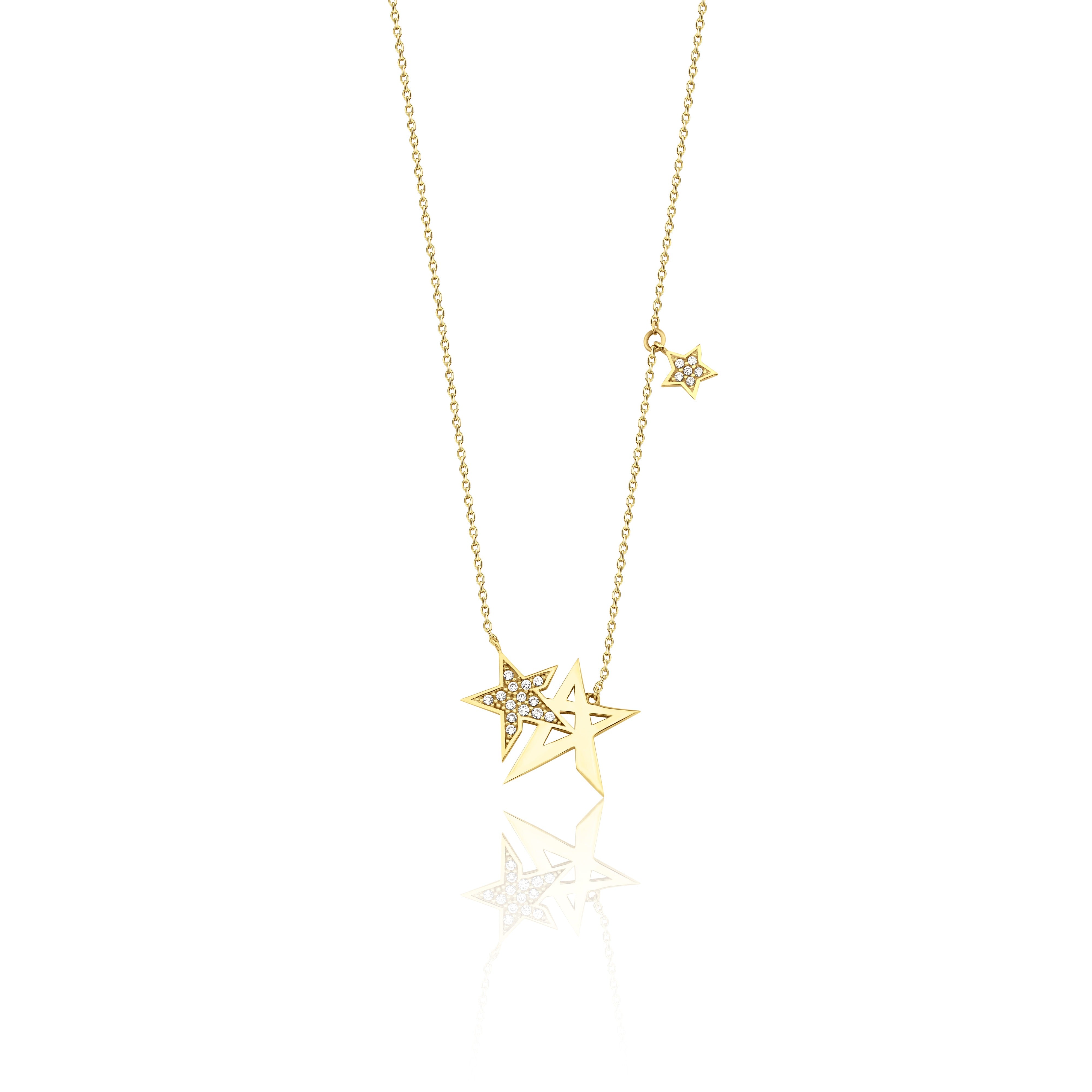star cluster necklace in yellow gold on a white background