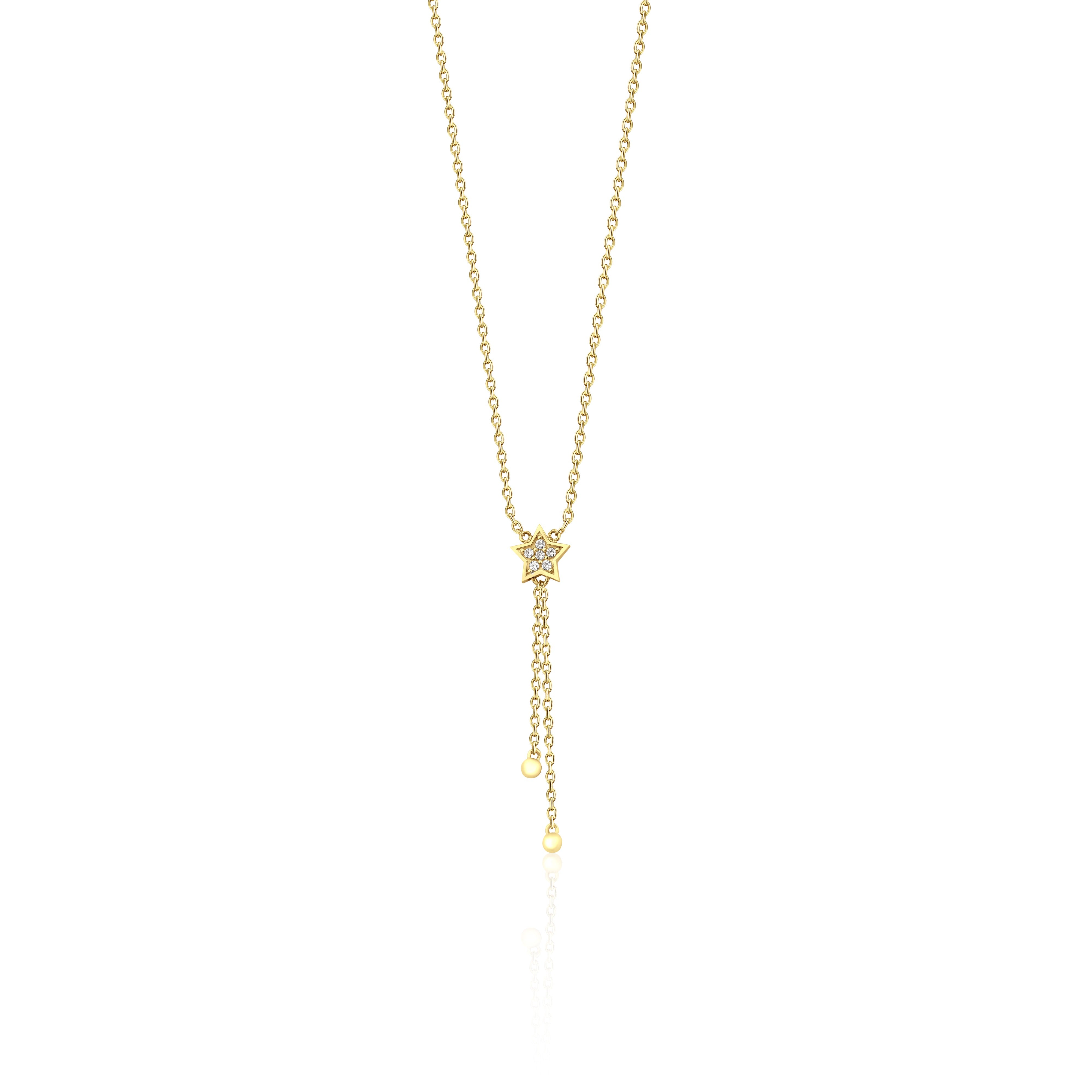 star drop necklace in yellow gold on a white background
