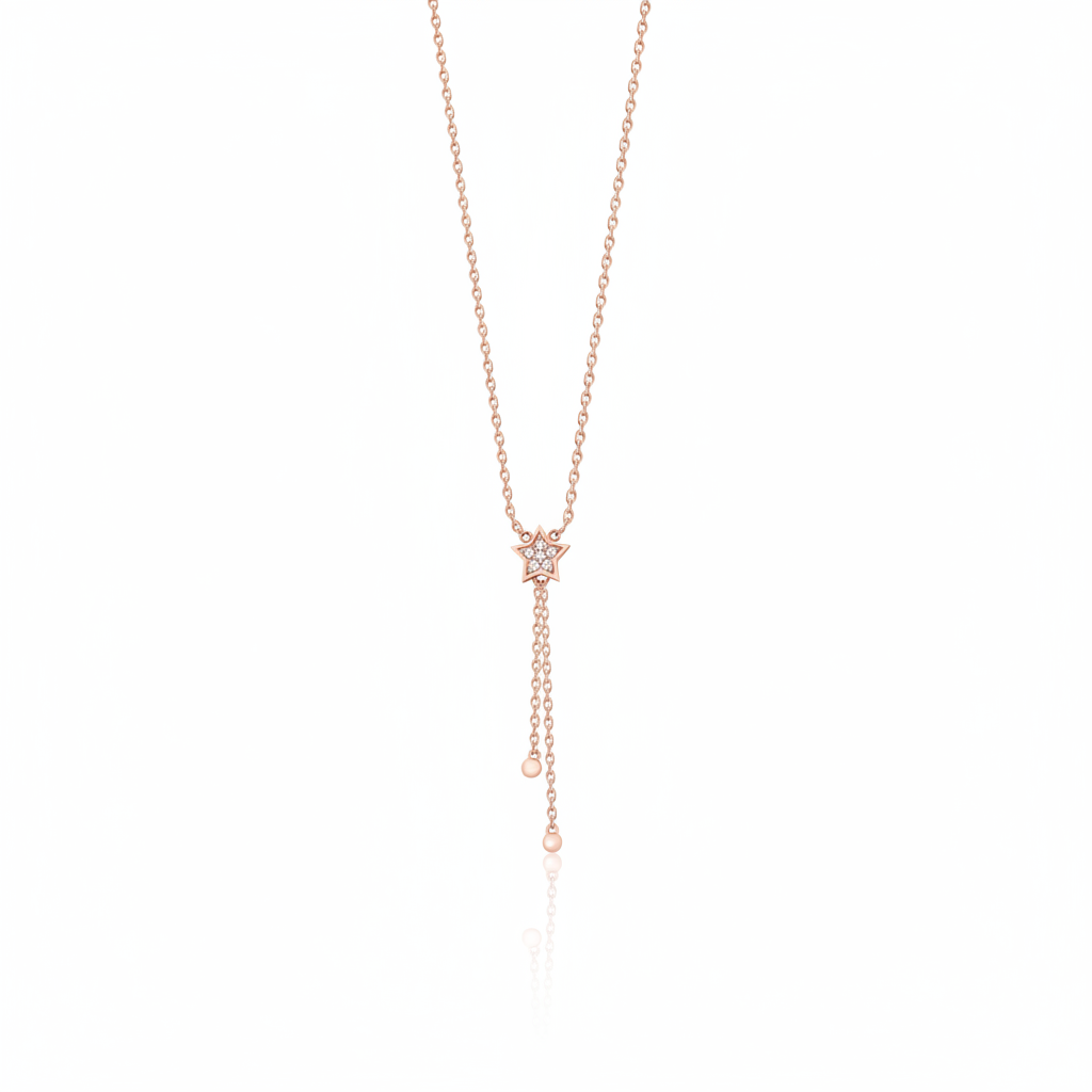 star drop necklace in rose gold on a white background